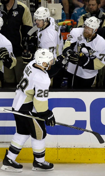 The Latest: Penguins lead Sharks 1-0 after first period